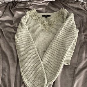 Light green sweater W/ Lettuce Trim around Collar